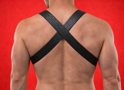 Elastic fetish eco leather gay harness with plastic ring in the middle of the chest.